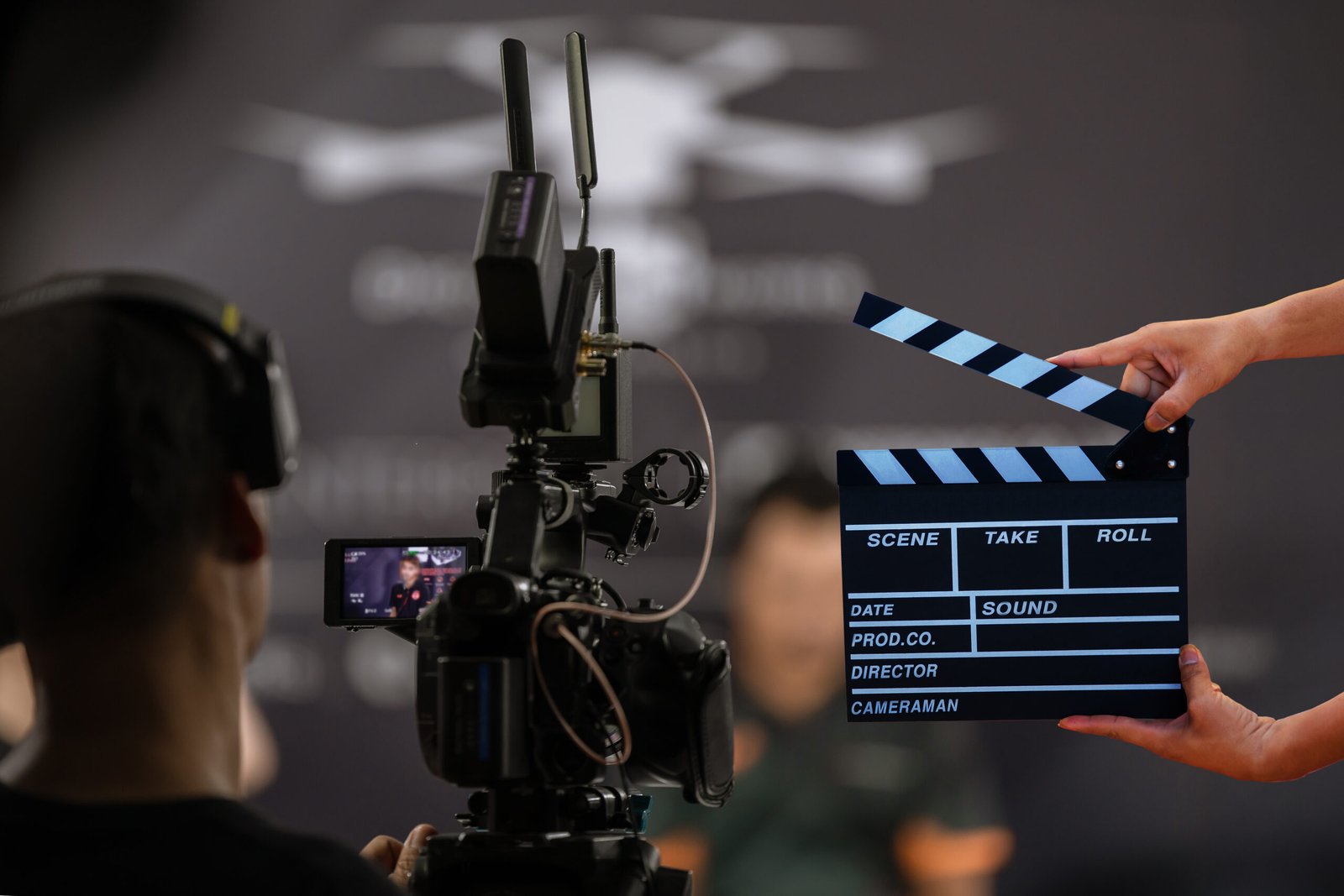 Film crew working with a clapperboard during production